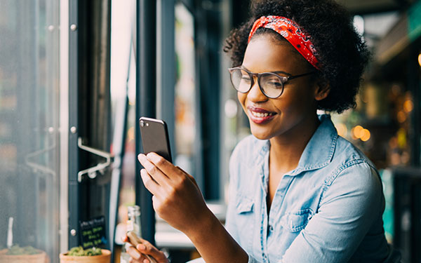 A woman looking at her mobile phone